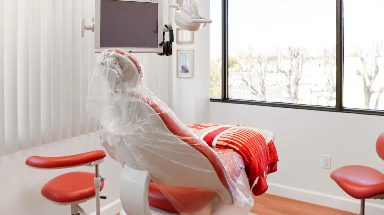 Dental chair in a treatment room at Seren Advanced Dentistry Oxnard
